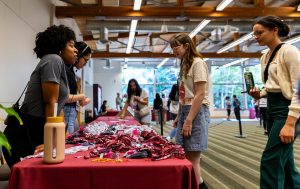 Jalá Harper (left) greets incoming students on move in day on Friday, Sept. 8, 2023 in Seattle. 