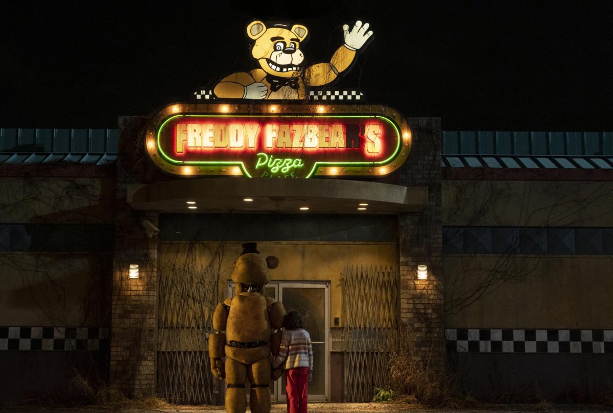 (from left) Golden Freddy and Abby (Piper Rubio) in Five Nights at Freddys, directed by Emma Tammi.