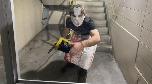 Chainsaw man scares students during the Haunted Ashton event in the side stairwell covered in blood. Oct 27 2023
