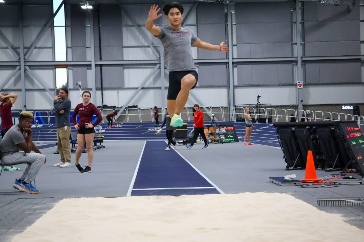 Seattle Pacific sophomore Brady Boun warms up with a practice jump before competing in Spokane Invitational on Saturday, Dec. 9, 2023.