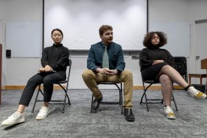 Naomi Kim (left), Callaghan Bluechel (center) and Esther Smith (right) take questions  during the ASSP election forum held in Demaray Hall on Monday, Feb. 12, 2024, in Seattle. Kim and Smith are running for ASSP President, while Bluechel runs unopposed for Vice President.