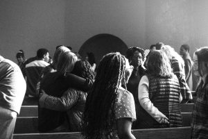Churchgoers converse after service on Nov. 19, 2023, in Seattle.
