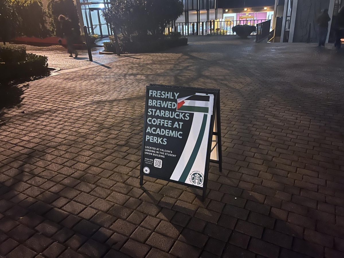 A Palestinian flag peels off a sign advertising SPUs Starbucks-adjacent coffee shop on Thursday, Jan. 25, 2024, in Seattle.