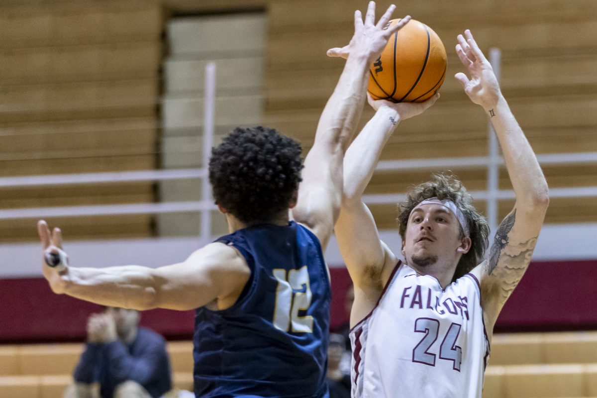Seattle Pacific University forward Shaw Anderson (24) takes a shot over a Montana State University Billings player during the first half of a GNAC basketball game on Saturday, Feb. 24, 2024, in Seattle
