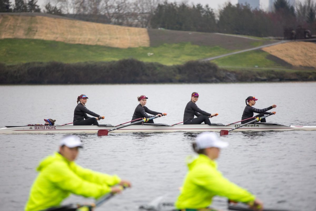 Seattle Pacific University senior Lucy Sandahl, sophomore Brittan Dalberg, junior Mary Goodhew, sophomore Bella Lisenby and sophomore Racquel Wesley line up next to Cal-Poly Humboldt for the start of the open 4+ at the Falcon Regatta on Saturday, Mar. 23, 2024, in Seattle.