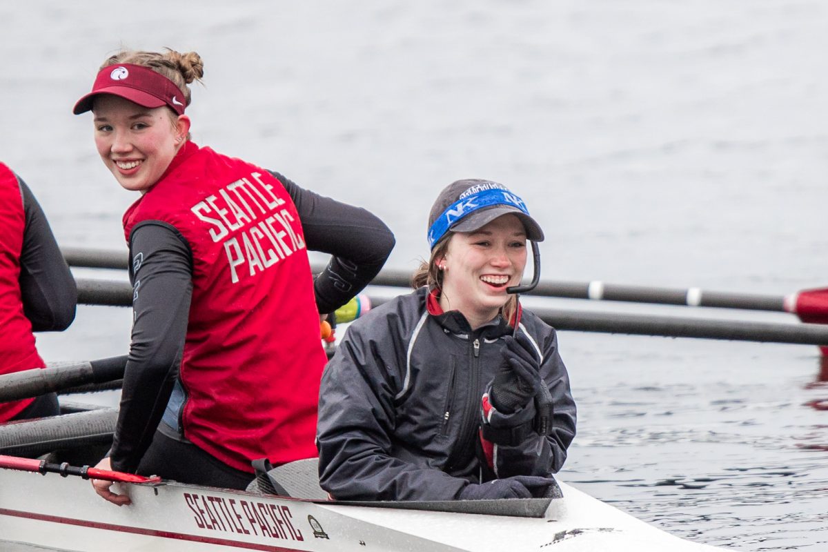 Siblings Sophie (left) and Lucy (right) Sandahl smile after a race in Lakewood, Wash. on March 4, 2023. Sophie now coaches at the Renton Rowing Center, passing on her passion to the middle schoolers in the program.