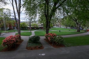 Students spend time in Tiffany Loop on Tuesday evening, April 2, 2024, in Seattle.