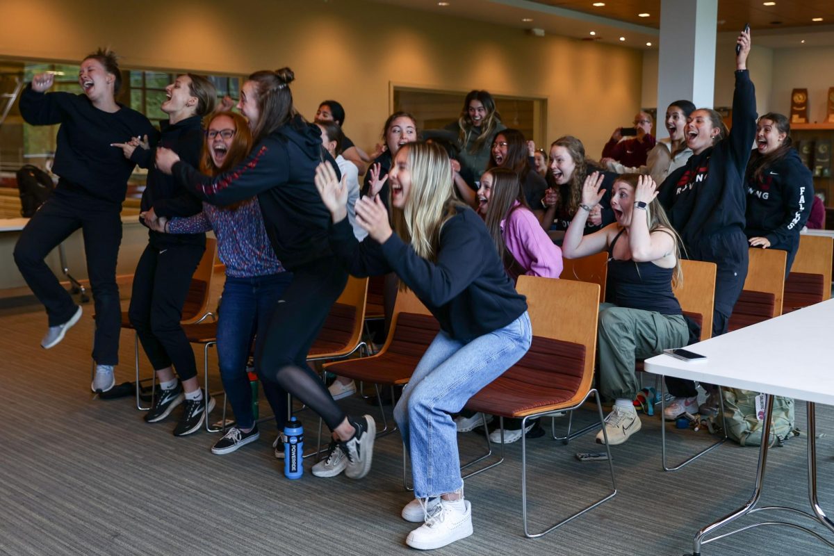 The Seattle Pacific University womens rowing team reacts after having their name called during the Division two national championship selection show on Tuesday, May 21, 2024, in Seattle.