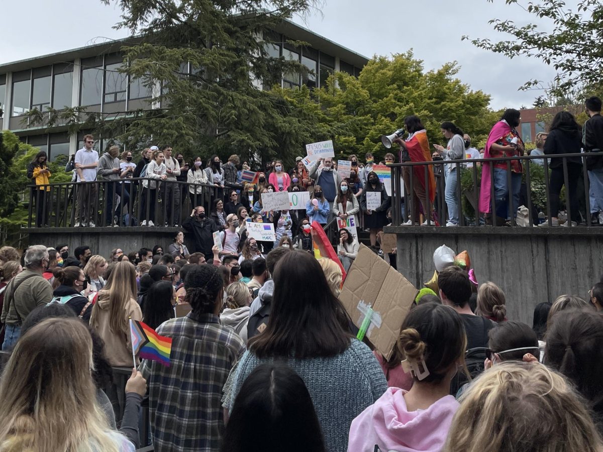 SPU students gather outside of Demaray Hall on May 24, 2022 in protest of the board of trustees decision to maintain their disputed hiring policy. This protest continued in the form of a sit-in, which lasted on SPUs campus for almost two months.