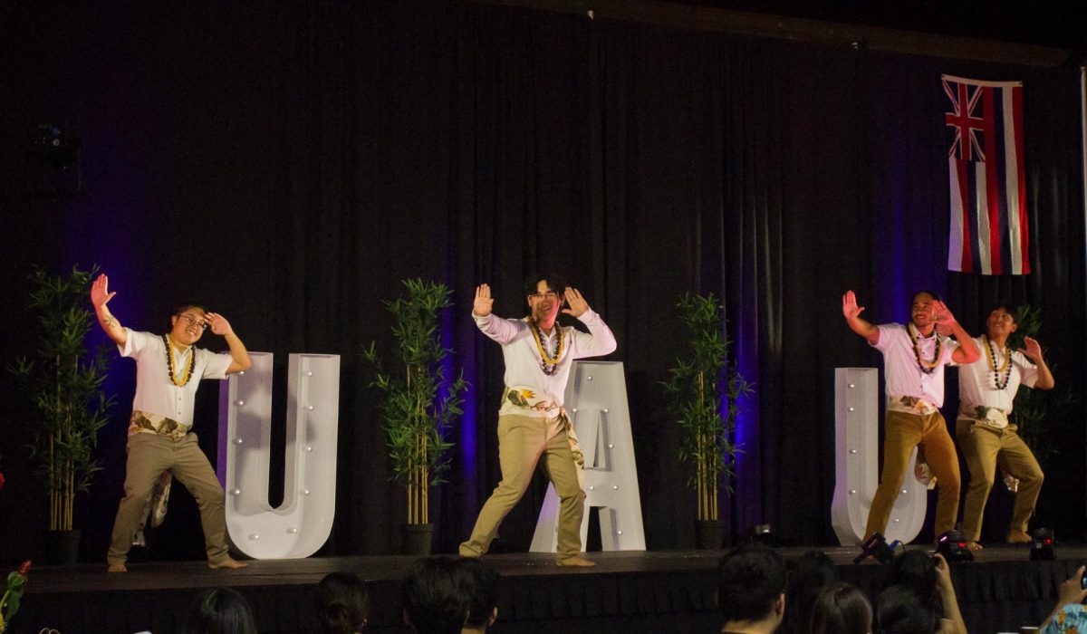 Students JJ Somera, Cam Banis, Ezra Michel, and Ylliam Umipig perform a men’s hula number at the 2023 Lu’au. 
