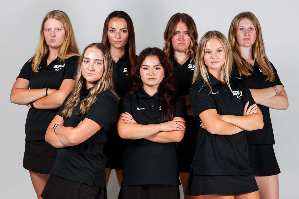 From left to right Zoe Garcia, Sophie Stamatis, Hannah Hochsprung, Anika Schau, Natalie Eklund, Brigitte Fenton and Sara Rhodes pose for a photo during media day Friday, Sept. 10, 2024, in Seattle.