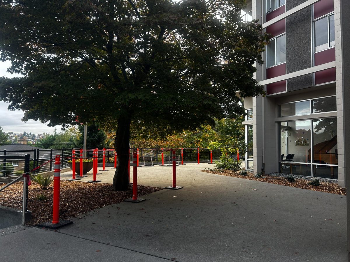 Orange barriers mark the site of continuing construction on the north side of Ashton Hall.