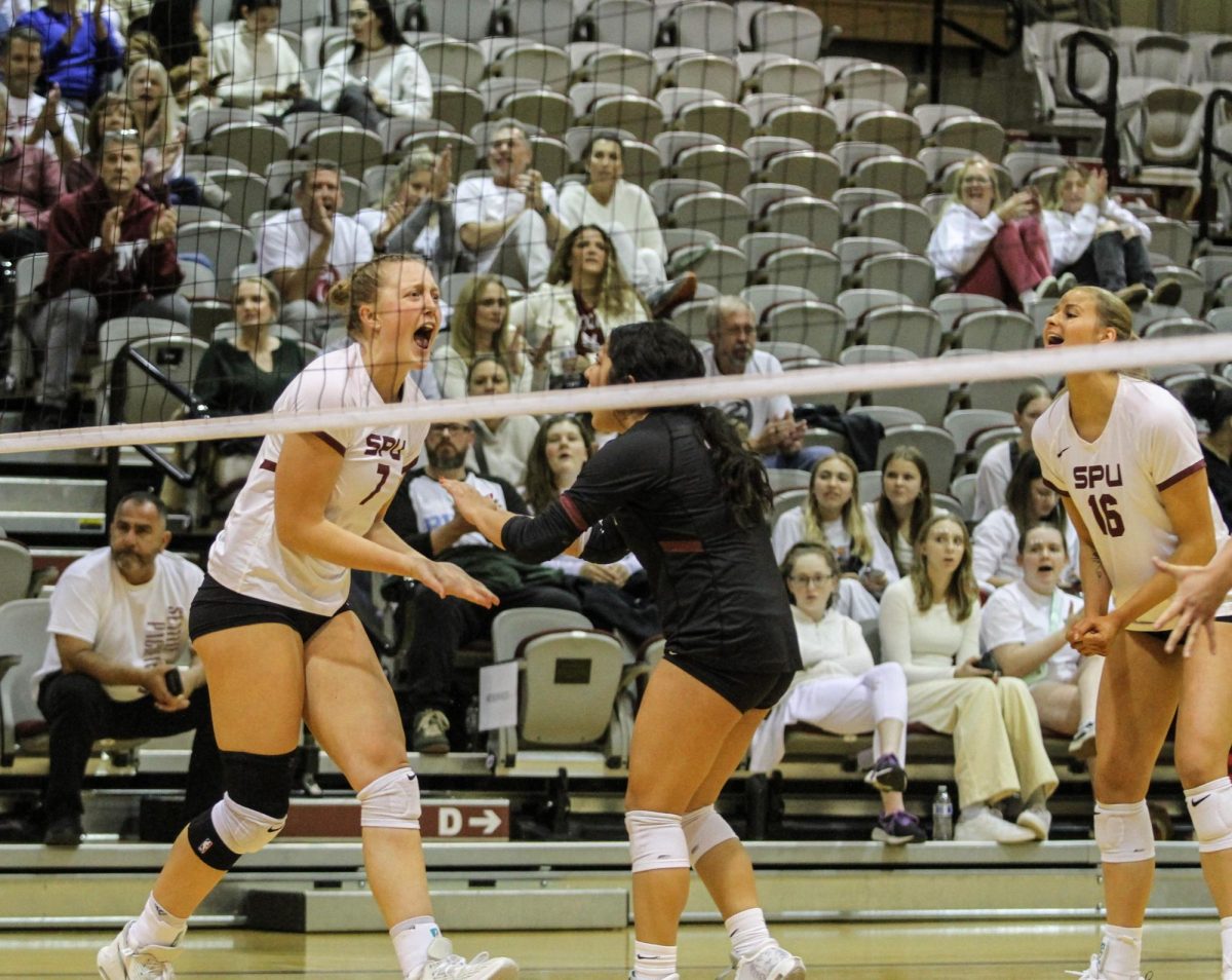 Scoring point celebrated by Hannah Hair (7) and Christina Lopez (17).