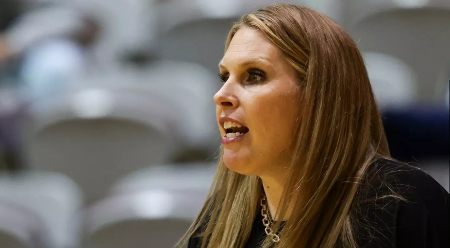 Interim head coach Karen Byers encourages her team from the sidelines.
(Courtesy of Seattle Pacific University Athletics)