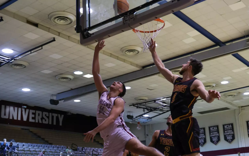 Junior forward Trace Evans delivers a layup against a Linfield Wildcat on Saturday, Nov. 23.
(Courtesy of Seattle Pacific University Athletics)