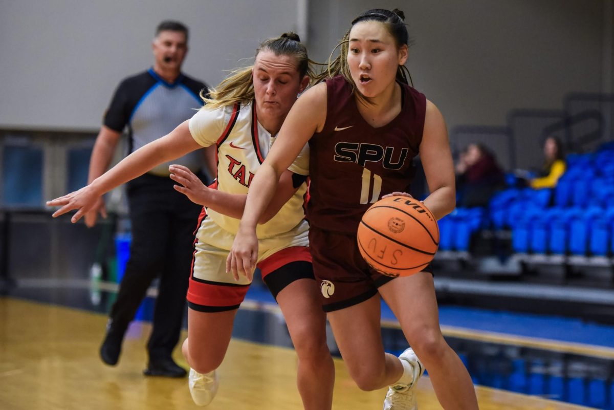 Second year Haylie-Anne Ohta (11) guards the ball against the University of Tampa on Nov. 4, 2024 in 
(Courtesy of SPU Athletics)