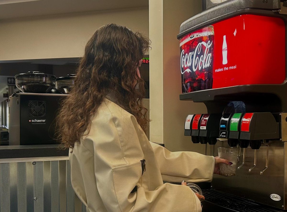 First year student using the new Coca Cola Machines in the Student Union Building on November 12th, 2024.