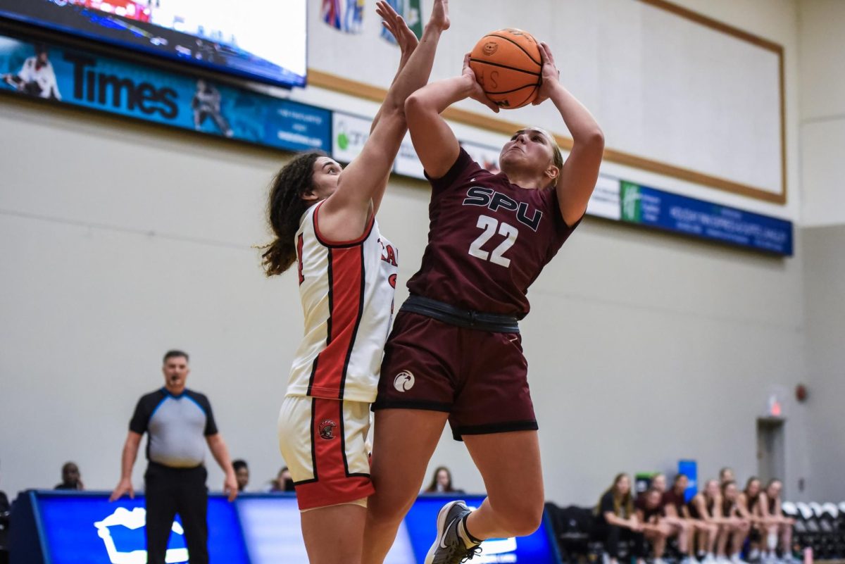 Second year Layne Kearns guards the ball against University of Tampa at the D22CA Canadian Tip-Off Classic from Nov. 1-3, 2024 in Langley, BC.
(Courtesy of SPU Athletics)