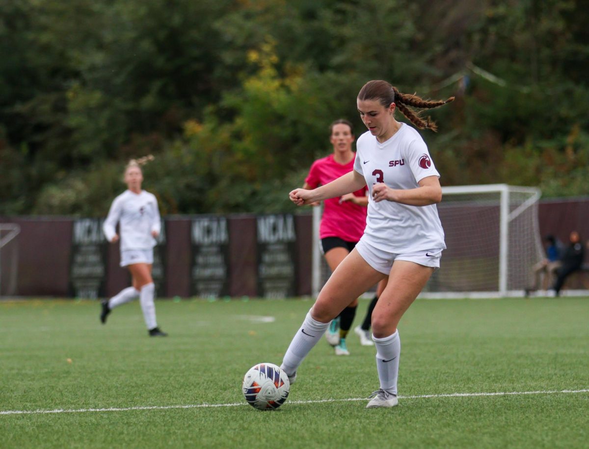 SPU sophomore Nora Patterson (3) drives the ball forward to lead the attack against MSU.