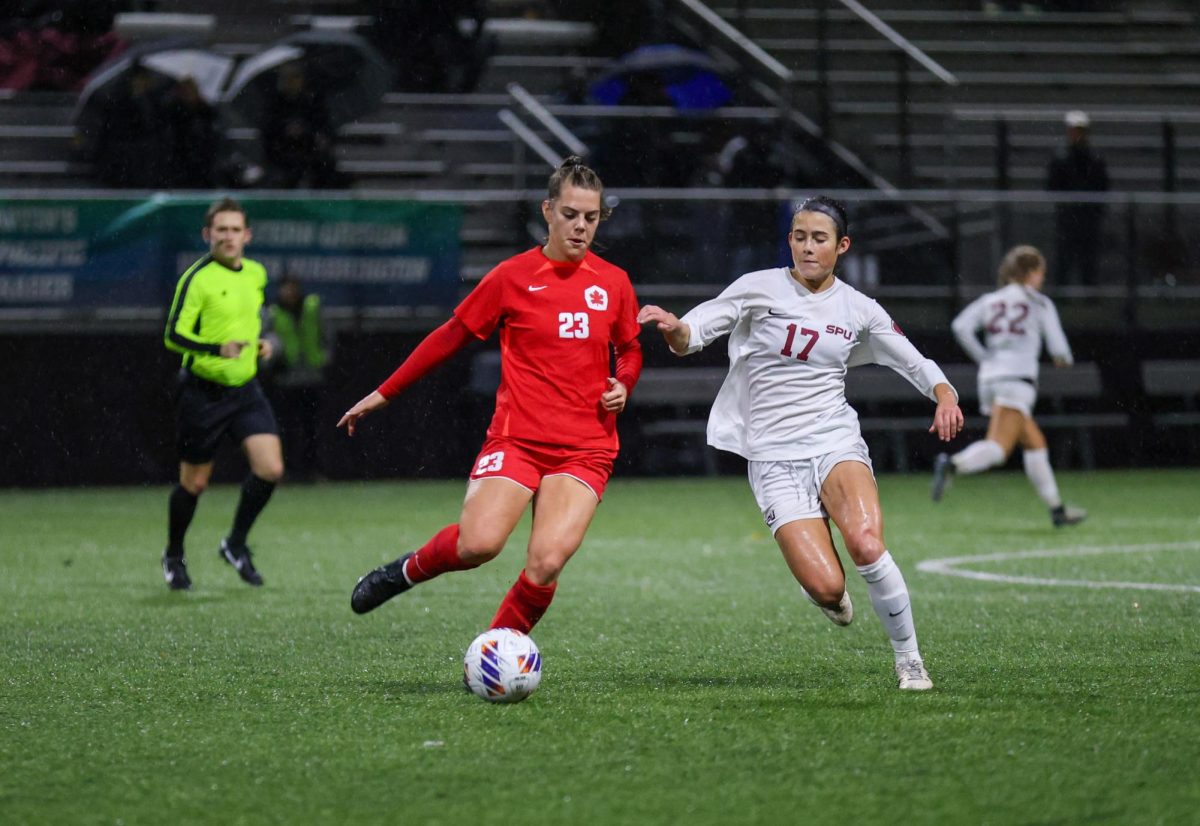 Seattle Pacific Ashlyn Valdovinos (17) fights for the ball against Simon Fraiser University on Thursday, Nov. 14, 2024, at Interbay Stadium.