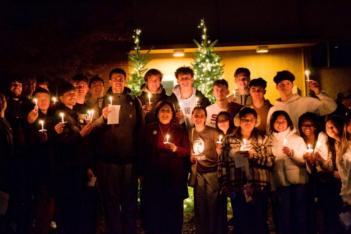 President Deana L. Porterfield of Seattle Pacific University with her students at the Inaugural Christmas Lighting on Monday, Dec. 2 in Seattle.