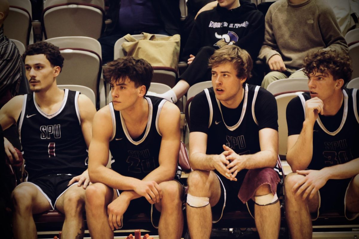 SPU Junior Owen Moriarty (1), Nikias Schoenerstedt (33), and Freshman Henry Sandberg (20), David Zachman(30) at the game against Chico State, Nov. 8, 2024, in Seattle.