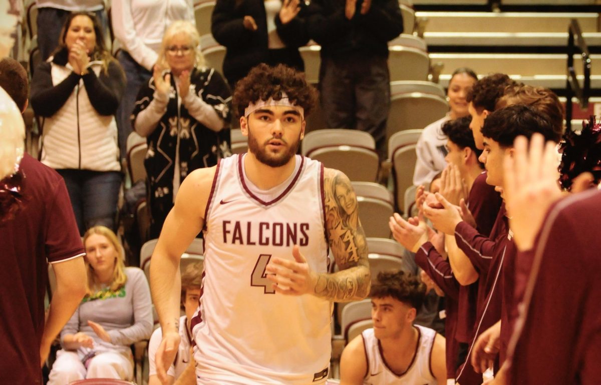 SPU Sophmore Jonas La Tour (4), making his entrance for the SPU vs Western Washington, Jan. 9, 2025.