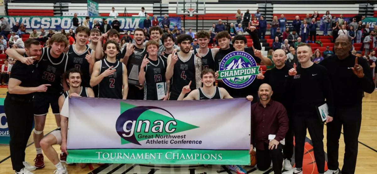 SPU men's basketball team poses for a photo after winning the GNAC Tournament. (Courtesy of SPU Athletics)