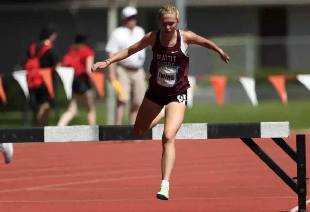 Junior Maya Ewing runs in the women's steeplechase event at the PLU Open on Saturday, March 8. (Courtesy of SPU Athletics)