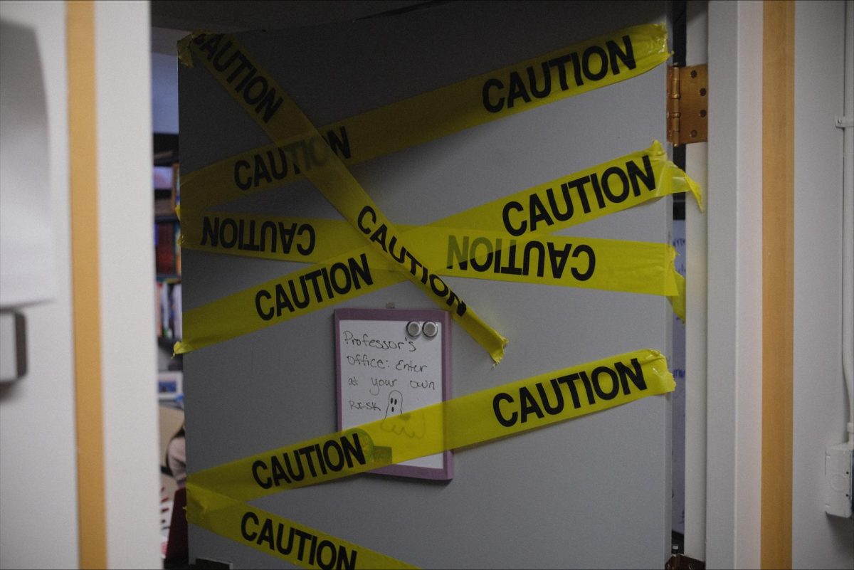Dr. Brittany Tausen's door decorated for The Hallowed Halls of Marston on Friday, October 31st, 2025.
