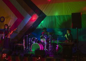Diana Gale and her band preforming at Redacted Fest